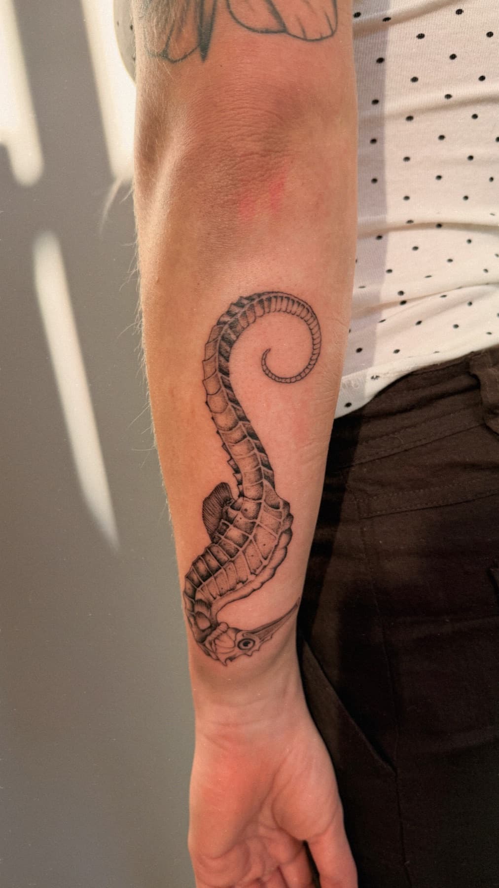 Black and grey leg tattoo