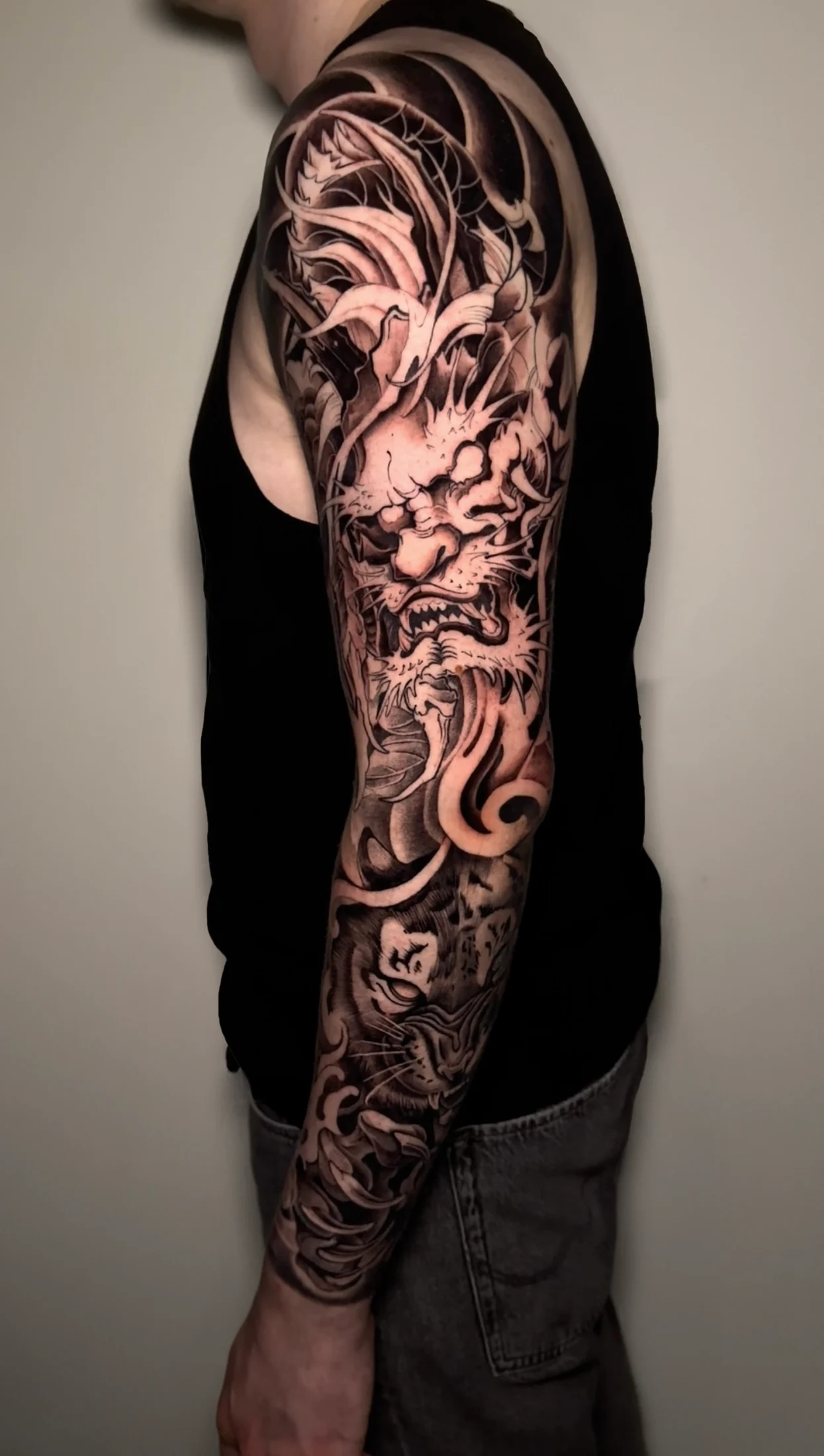 Custom black and grey tattoo from Infinity Tattoo