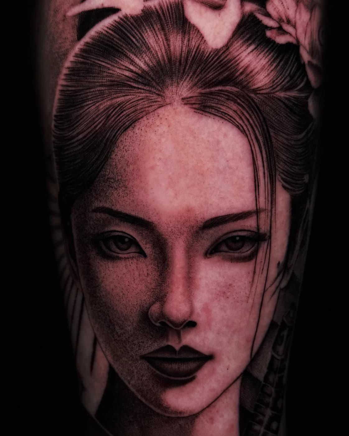 Black and grey geisha portrait tattoo close up