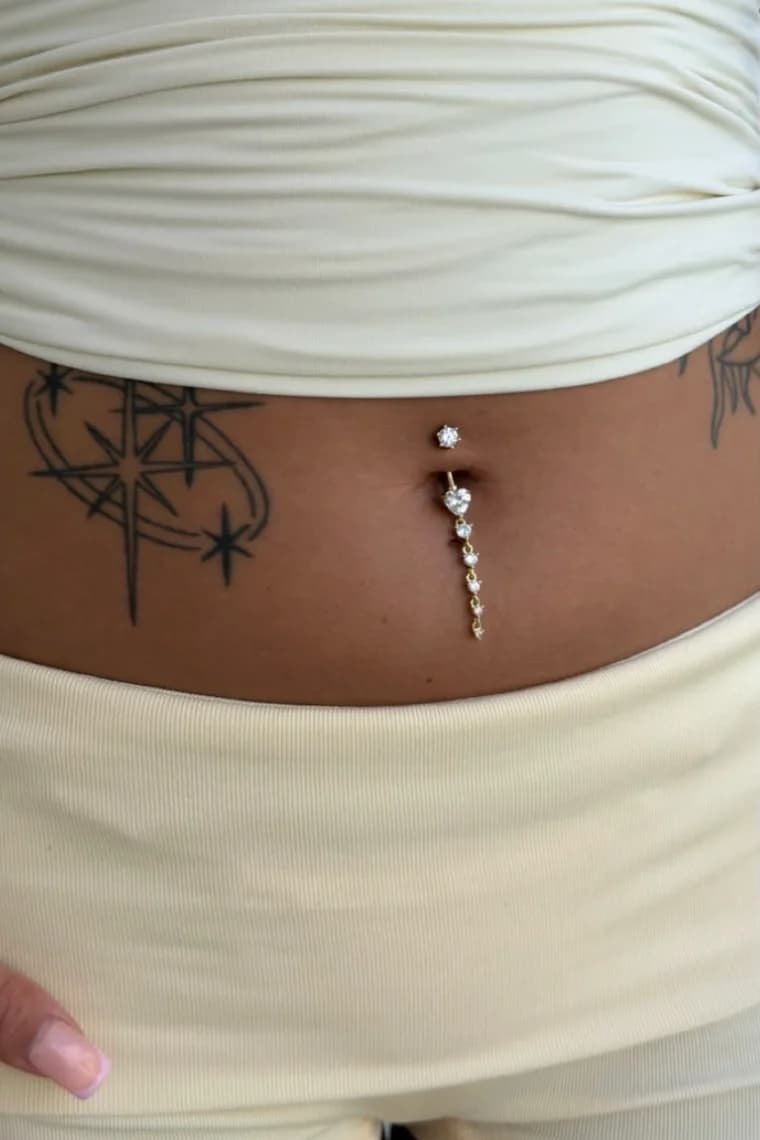 Navel piercing jewelry by Supreme.Gemz at Infinity Tattoo Studio