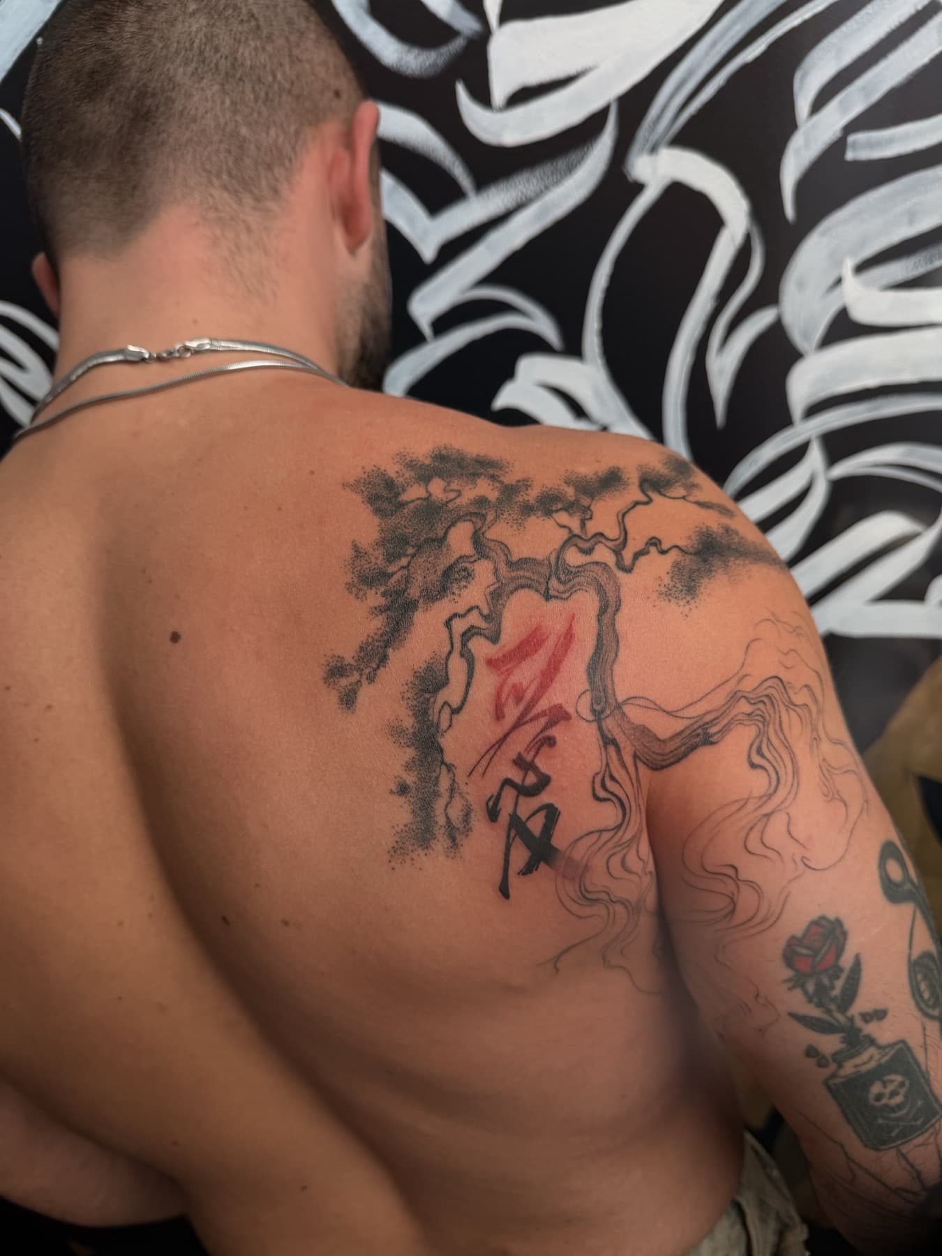 Back tattoo before cover-up session